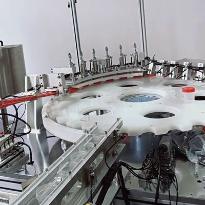 Máy đóng gói và vặn nắp cốc đựng nước tiểu với hiệu suất cao, vận hành hiệu quả, tỷ lệ đạt chuẩn cao, điều khiển bằng servo