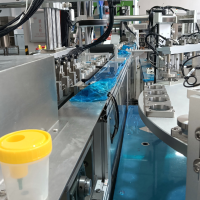 Máy lắp ráp cốc đựng nước tiểu tự động không chuẩn, máy tích hợp dán nhãn và đóng gói, hiệu quả cao
